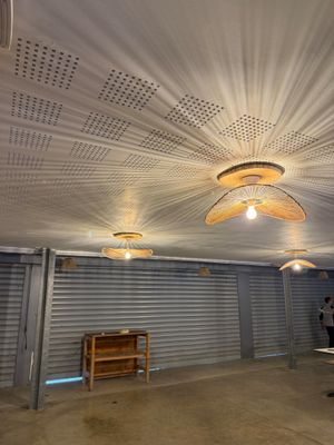 a room that has a lot of lights on the ceiling