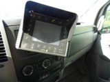 a picture of a car dashboard with a tablet on it