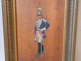 tableau représentant un soldat en uniforme, dans un cadre doré