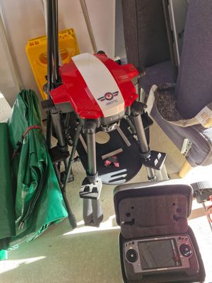 a suitcase that is sitting on the floor next to a chair