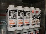 many bottles of train power on a shelf in a store