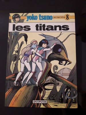 la couverture de la bande dessinée « Les Titans », sur laquelle on voit deux femmes à bord d'un bateau