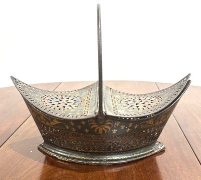 an image of a metal umbrella on top of a wooden table