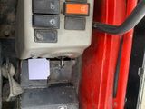 a close up of a car ' s engine and dashboard