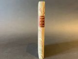 a close up of a cigar sitting on top of a table