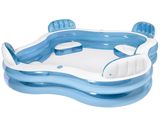 an inflatable swimming pool with an inflatable seat on the bottom