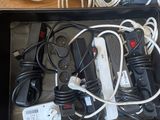 a black box with a bunch of wires and cords in it