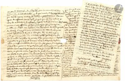 a close up of two pages of paper with writing on them