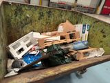 a picture of a dumpster filled with assorted items