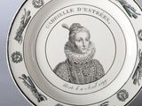 a plate with a picture of a woman on it