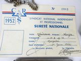 a picture of a certificate and a pen on a table