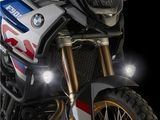 a close up of a motorcycle on a black background