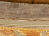a close up of a piece of wood on a chair