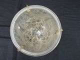 a glass bowl that has a lot of noodles in it