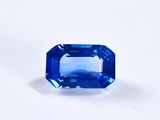 a blue sapphire stone on a white background