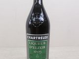 a bottle of wine that is sitting on a table