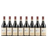 six bottles of red wine lined up in a row