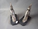 pair of art deco bookends of a bird on a marble base