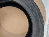 tires are stacked on top of a cardboard box on a table