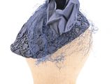 blue and black hat with lace and bow