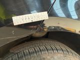 a close up of a car with a sticker on the front of it