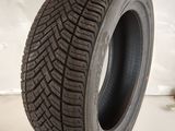 a close up of a tire on a white surface