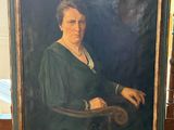 tableau représentant une femme en robe verte, assise sur une chaise