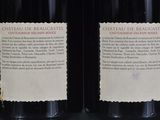 two bottles of wine that are sitting on a table