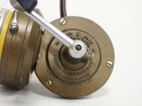 a close up of a fishing reel with a handle