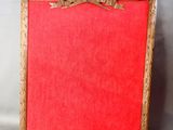 an image of a red picture frame with a bow on it