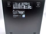 the back of a laptop with a black back panel and a white back panel