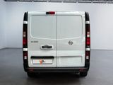 a white van that is parked in a room