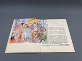 un livre ouvert sur lequel figure l'image d'un groupe de personnes