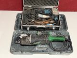 a tool in a case that is sitting on a table