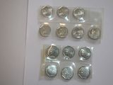 a lot of coins that are on the table