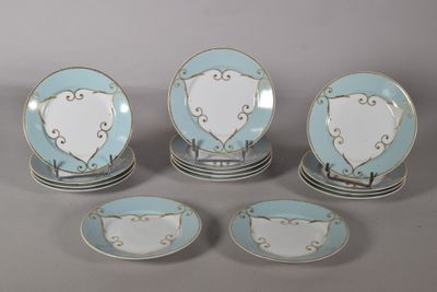six blue and white plates with hearts on them sitting on top of each other