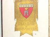 an open book with a picture of a coat of arms on it