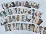 a picture of a bunch of old postcards on a table