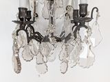 a crystal chandelier hanging from the ceiling