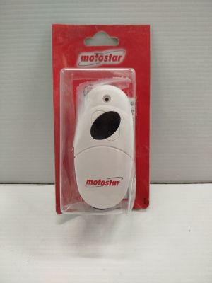 a small white mouse in a package on a table