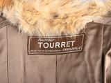 jacket with a fur collar and a leather patch on the back