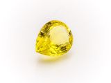 a yellow diamond on a white background