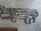 four wrenes that are laying on the floor