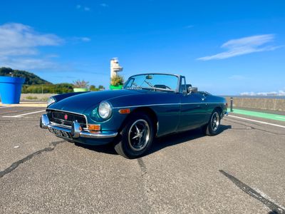 an image of a classic car parked in a parking lot