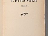 an open book with a black and white title on it