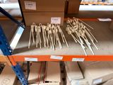 a lot of toothpicks on a shelf in a store