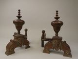 pair of antique wooden candlesticks with ornate designs on them