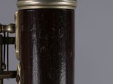 a close up of a musical instrument on a gray background