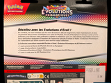 a box of pokemon evolutions trading cards on a table