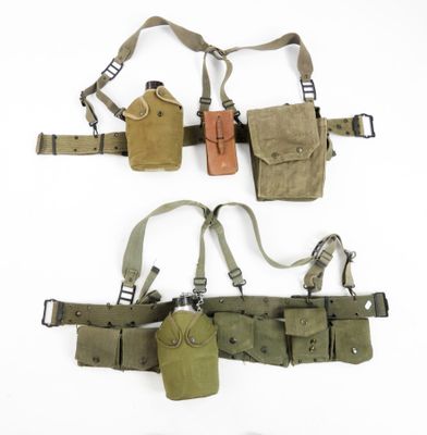three different types of military pouchs are lined up on a white surface
